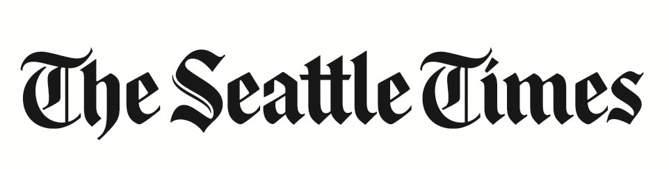 Picture of The Seattle Times in cursive black letters