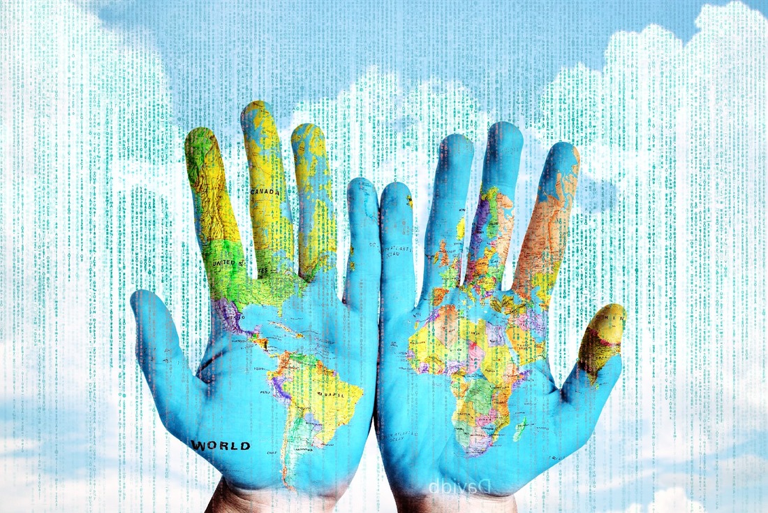 Picture of the world map overlaid onto blue open hands with a blue sky and clouds in the background.ln
