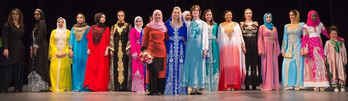 Malikah Festival models; smiling women; women in dresses; headscarves; jewelry; models; modeling; Malikah Festival;